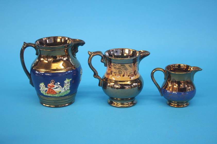 Four copper lustre jugs, a Royal Doulton vase, a late Spode jug and a treacle glaze money box (7) - Image 2 of 4