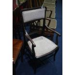 An Edwardian mahogany open armchair