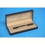 A boxed Dunhill fountain pen, the nib stamped 14ct