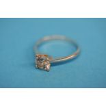 A platinum ring set with solitaire diamond, stampe