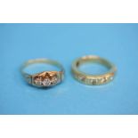 An 18ct gold ring set with 8 diamonds and another