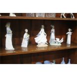 Four Lladro figures and one other (5)