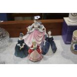 Four various Royal Doulton figures