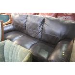 Brown leather settee
