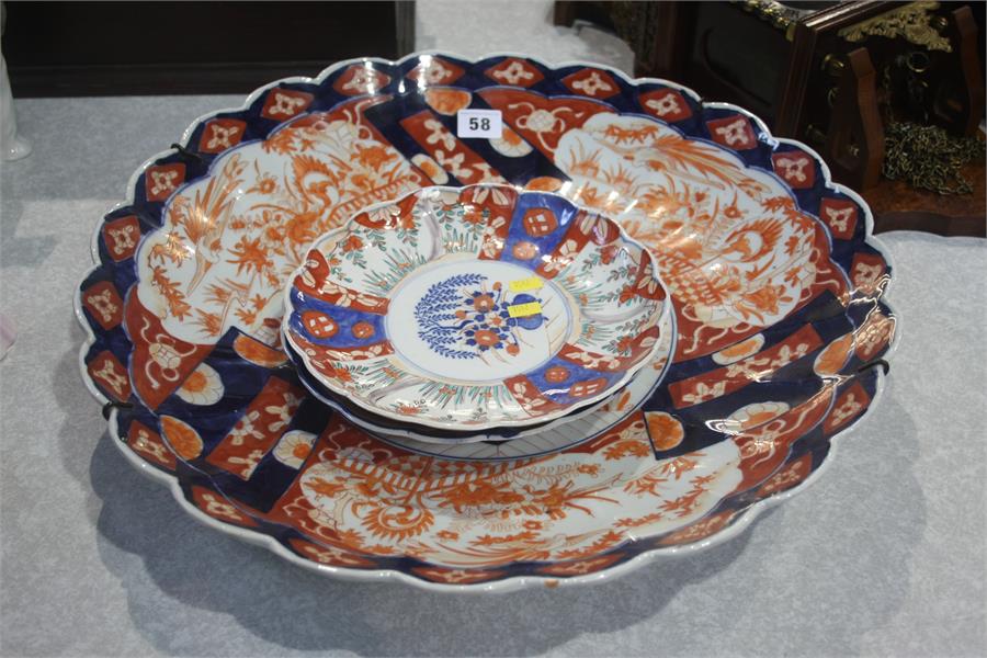 Large Imari charger and two plates