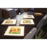 A set of five decorative framed plaques