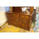 A Titchmarsh and Goodwin type oak dresser base 137