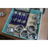 Silver condiments and a cased set of spoons