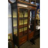 An Edwardian mahogany china cabinet