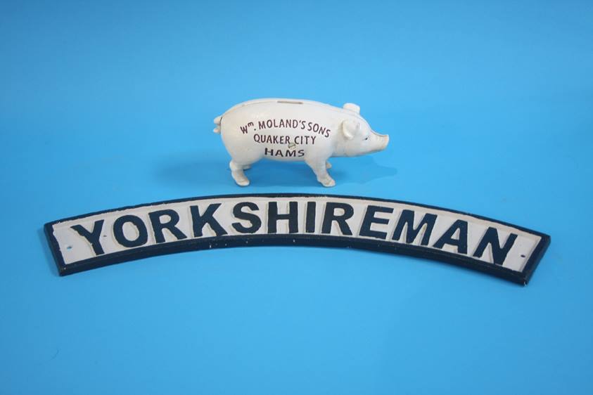 Cast iron Yorkshireman sign and a Quaker City Hams