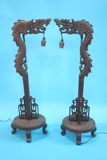 Pair of carved Oriental style table lamps