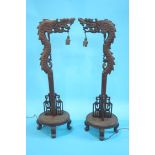 Pair of carved Oriental style table lamps