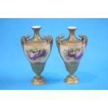 A pair of Royal Worcester vases decorated with gil