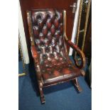A Chesterfield red leather rocking chair