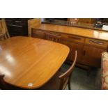 A teak G plan table and four chairs