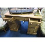 A Heal and son of London pitch pine pedestal desk