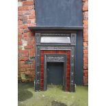 Cast iron fire surround with tiled inset