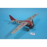 A tin plate Mettoy clock work airplane