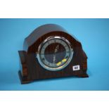 A walnut cased mantle clock