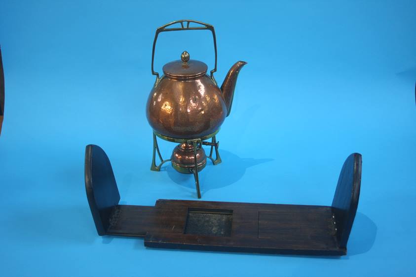 An Arts and Crafts brass and copper spirit kettle
