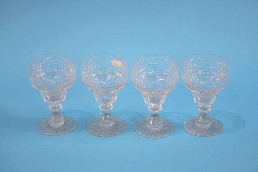 Four good quality cut glass wine glasses