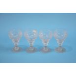 Four good quality cut glass wine glasses