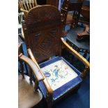 A carved oak carver chair