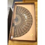 A lace fan mounted in a mahogany case