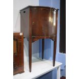 A 19th century mahogany bow front bedside cabinet