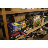 Shelf of various board games, toys etc.