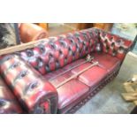 Chesterfield burgundy armchair and settee