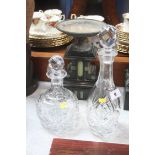 Two cut glass decanters