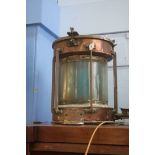 A brass and copper ships lamp