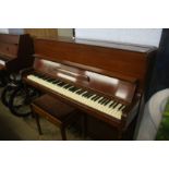 A mahogany cased Eavestaff upright piano