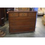 A straight front mahogany chest of three short over three long drawers