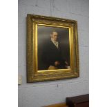 A gilt framed print