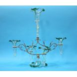 A silver plated and green swirled glass epergne, with five trumpet shaped spill vases and