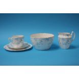A Charles Wileman Foley china tea service, decorated with blue roses. Comprising of; two cake