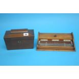 A small mahogany tea caddy and a mahogany three bottle inkwell. (2)