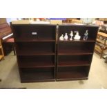 A pair of reproduction mahogany open bookcases