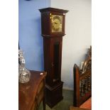 A reproduction mahogany grand daughter clock