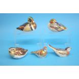 Five Royal Crown Derby paperweights, a 'Dappled Quail', 'Linnet', 'Teal', Carolina Duck', and a '