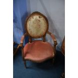 A Victorian walnut armchair and a Continental armchair