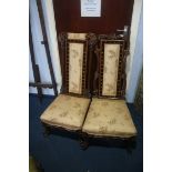A pair of ladies and gents rosewood Prie Dieu chairs