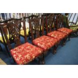 A set of four reproduction mahogany dining chairs