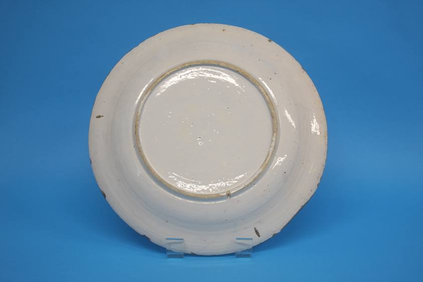 A late 18th century to early 19th century tin glazed earthenware blue and white plate. 35cm - Image 5 of 5