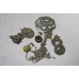 A bag of costume jewellery, military badges etc.