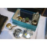 A box containing a pair of silver plated preserve pots, a silver gilt medal etc.