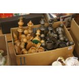 A box of large wooden chess pieces
