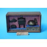 A cased set of jade and bronze Oriental items